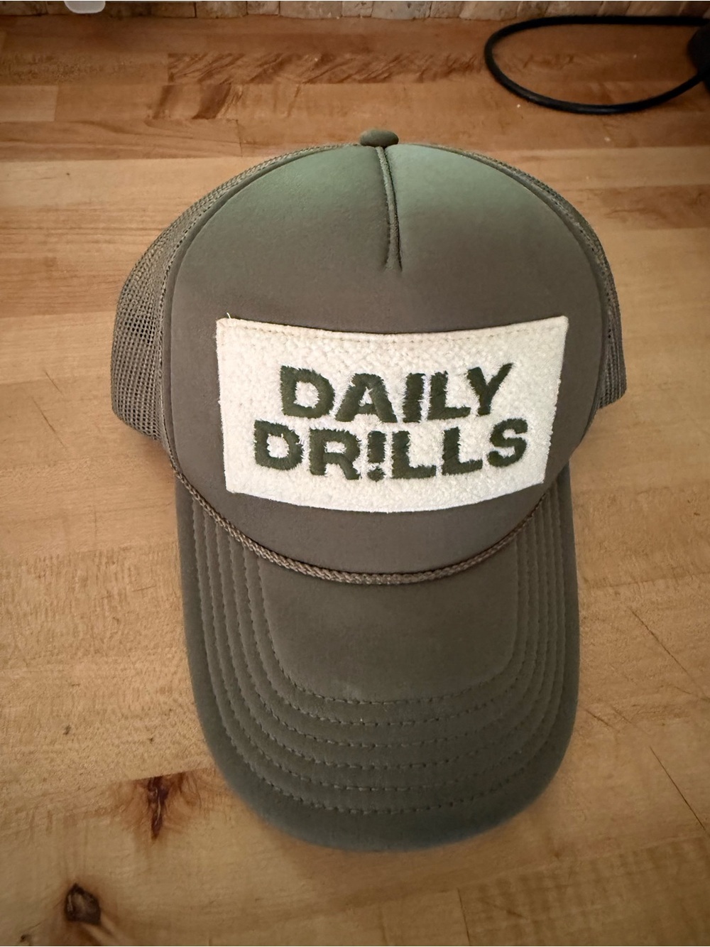 Daily Drills Olive Green Mesh Trucker Hat with Cream Patch